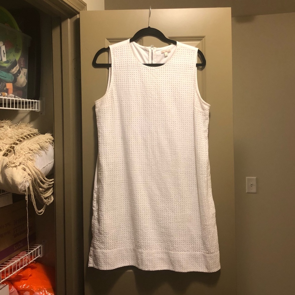 Sleeveless white shift dress